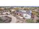 Overhead view of a desert home showcasing solar panels and desert landscaping at 2107 N Campo Allegre Dr, Tempe, AZ 85288