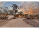 Beautiful single-story home with desert landscaping, and inviting covered porch at 2107 N Campo Allegre Dr, Tempe, AZ 85288