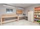 Well-lit garage with workspace and ample storage space at 2107 N Campo Allegre Dr, Tempe, AZ 85288