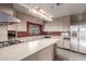 Kitchen featuring stainless steel appliances and tile backsplash at 2107 N Campo Allegre Dr, Tempe, AZ 85288