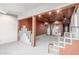 This spacious living room showcases brick detail, hardwood and neutral walls at 2107 N Campo Allegre Dr, Tempe, AZ 85288