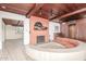 Open-concept living room with sunken seating area and fireplace at 2107 N Campo Allegre Dr, Tempe, AZ 85288