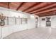 Spacious living room features built-in cabinets and tiled floors at 2107 N Campo Allegre Dr, Tempe, AZ 85288