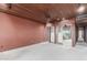 This living room includes paneled walls, neutral carpet and mirrored closet at 2107 N Campo Allegre Dr, Tempe, AZ 85288