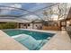 Private swimming pool with a screened enclosure, perfect for year-round enjoyment at 2107 N Campo Allegre Dr, Tempe, AZ 85288