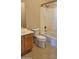A bathroom with a white toilet, tub, and shower combination at 2241 E Pinchot Ave # B3, Phoenix, AZ 85016