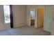 The primary bedroom features neutral paint and carpet flooring and a ensuite bathroom at 2241 E Pinchot Ave # B3, Phoenix, AZ 85016
