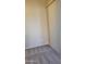 A carpeted bedroom features neutral walls and a vertical window blind at 2241 E Pinchot Ave # B3, Phoenix, AZ 85016