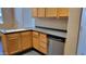 Bright kitchen features updated appliances, tile floors and light wood cabinetry at 2241 E Pinchot Ave # B3, Phoenix, AZ 85016