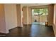 Open-concept living room with dark tile floors and large sliding doors, seamlessly connecting indoor/outdoor living at 2241 E Pinchot Ave # B3, Phoenix, AZ 85016