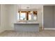 Stylish bar area featuring modern countertops and a window offering scenic views at 24548 N 121St Pl, Scottsdale, AZ 85255
