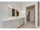 Bright bathroom features quartz counters, pendant lights and view to a closet at 24548 N 121St Pl, Scottsdale, AZ 85255