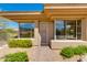 Charming home exterior with a landscaped walkway leading to the front entrance at 24548 N 121St Pl, Scottsdale, AZ 85255