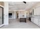 Bright kitchen with a large island, stainless appliances, and light-filled open floor plan at 24548 N 121St Pl, Scottsdale, AZ 85255