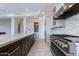 Modern kitchen design featuring a large island and professional appliances at 24548 N 121St Pl, Scottsdale, AZ 85255