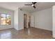 Main bedroom with great natural light, neutral walls, and tile floors at 24548 N 121St Pl, Scottsdale, AZ 85255