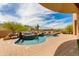 Inviting backyard pool and spa surrounded by desert landscape with mountain views at 24548 N 121St Pl, Scottsdale, AZ 85255
