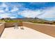 Mountain views from rooftop deck with chairs on a sunny day with blue skies at 24548 N 121St Pl, Scottsdale, AZ 85255
