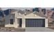 Charming single-story home features a two-car garage and low maintenance desert landscaping at 25430 W Graham Trl, Buckeye, AZ 85326