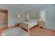 Bright and airy main bedroom with hardwood floors, a ceiling fan, and a cozy rug at 26439 W Covey Ln, Buckeye, AZ 85396