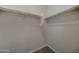 Walk-in closet with closet rod, perfect for organizing clothes and accessories at 26439 W Covey Ln, Buckeye, AZ 85396