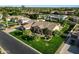 Stunning aerial view of a well-manicured property with lush landscaping, a spacious layout, and a welcoming curb appeal at 3531 E Norwood Cir, Mesa, AZ 85213