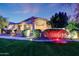 Charming home with meticulous landscaping, manicured lawn, and inviting curb appeal at 3531 E Norwood Cir, Mesa, AZ 85213