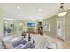 Open kitchen design featuring granite countertops, stainless steel appliances, and seamless flow into the living area at 3531 E Norwood Cir, Mesa, AZ 85213