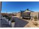 The backyard features a trampoline and outdoor furniture, offering space for both relaxation and recreation at 36284 W San Clemente Ave, Maricopa, AZ 85138