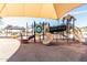 A colorful community playground featuring slides and shaded areas, designed for play and outdoor activities at 36284 W San Clemente Ave, Maricopa, AZ 85138