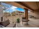 Inviting balcony with comfortable seating and scenic desert views, perfect for relaxation at 36601 N Mule Train Rd # 40A, Carefree, AZ 85377