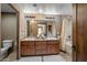 Bathroom with a double vanity, lots of storage, shower and bathtub with neutral tones at 36601 N Mule Train Rd # 40A, Carefree, AZ 85377
