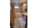 Bathroom featuring tiled shower, whirlpool bathtub, and neutral color palette at 36601 N Mule Train Rd # 40A, Carefree, AZ 85377
