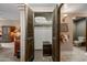 Hallway closet featuring plenty of pillows, storage space and convenient access at 36601 N Mule Train Rd # 40A, Carefree, AZ 85377