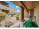 Covered patio with comfortable seating and beautiful desert landscape views at 36601 N Mule Train Rd # 40A, Carefree, AZ 85377