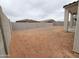 A spacious backyard with block wall and a covered patio, great for outdoor living at 37342 W San Clemente St, Maricopa, AZ 85138