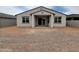 Backyard featuring a covered patio, offering space for relaxation and entertaining at 37342 W San Clemente St, Maricopa, AZ 85138