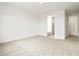 Spacious bedroom featuring neutral carpet and white walls, providing a serene and inviting atmosphere at 37342 W San Clemente St, Maricopa, AZ 85138