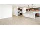 Bright kitchen with modern cabinets, a center island, and stainless steel appliances at 37342 W San Clemente St, Maricopa, AZ 85138