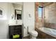 Bathroom with dark vanity and bathtub at 41688 N 111Th Pl, Scottsdale, AZ 85262