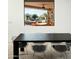 Dining area with modern furniture and views of the desert landscape at 41688 N 111Th Pl, Scottsdale, AZ 85262