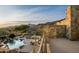 Desert oasis featuring a beautiful pool, outdoor seating, and stunning mountain views at 41688 N 111Th Pl, Scottsdale, AZ 85262