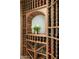 Custom wine cellar with wooden racks and display niche at 41688 N 111Th Pl, Scottsdale, AZ 85262