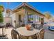 Covered patio with space for entertaining provides easy access to the yard and pool at 4630 W El Caminito Dr, Glendale, AZ 85302