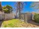 Fully fenced backyard with mature trees, shed, and plenty of room to enjoy at 4630 W El Caminito Dr, Glendale, AZ 85302