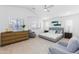 Large and bright bedroom with a ceiling fan and ensuite bathroom at 470 S Soho Ln # 1, Chandler, AZ 85225
