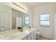 Bright bathroom with double vanity, large mirror, and natural light at 5310 W Melinda Ln, Glendale, AZ 85308