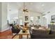 Spacious living room with vaulted ceiling, fireplace, and plenty of room for entertaining at 5310 W Melinda Ln, Glendale, AZ 85308