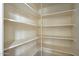 Walk-in pantry featuring shelving and storage at 5310 W Melinda Ln, Glendale, AZ 85308