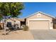Charming home featuring a well-maintained front yard and a two-car garage at 6129 S White Pl, Chandler, AZ 85249